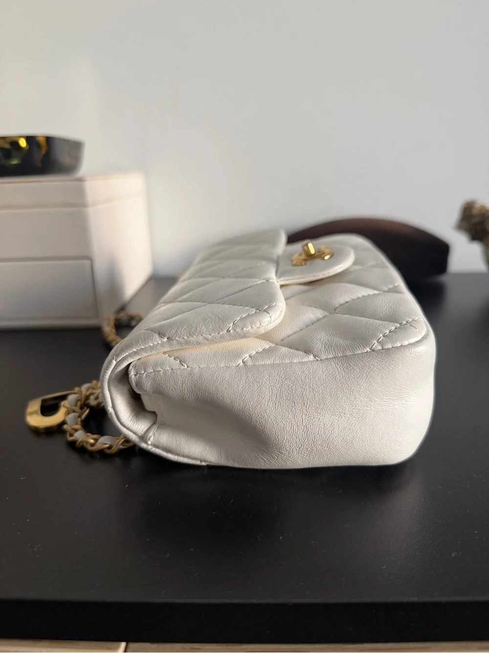 CHANEL White Quilted Mini Flap Bag with Gold Chain and CC Turn-Lock